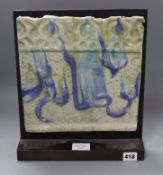 A 14th century Kashan lustre tile, on stand overall height 33cm