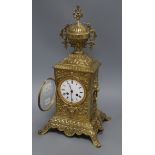 A cased brass mantel clock height 47cm