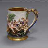 A Naples porcelain mug, decorated with a classical scene height 14cm