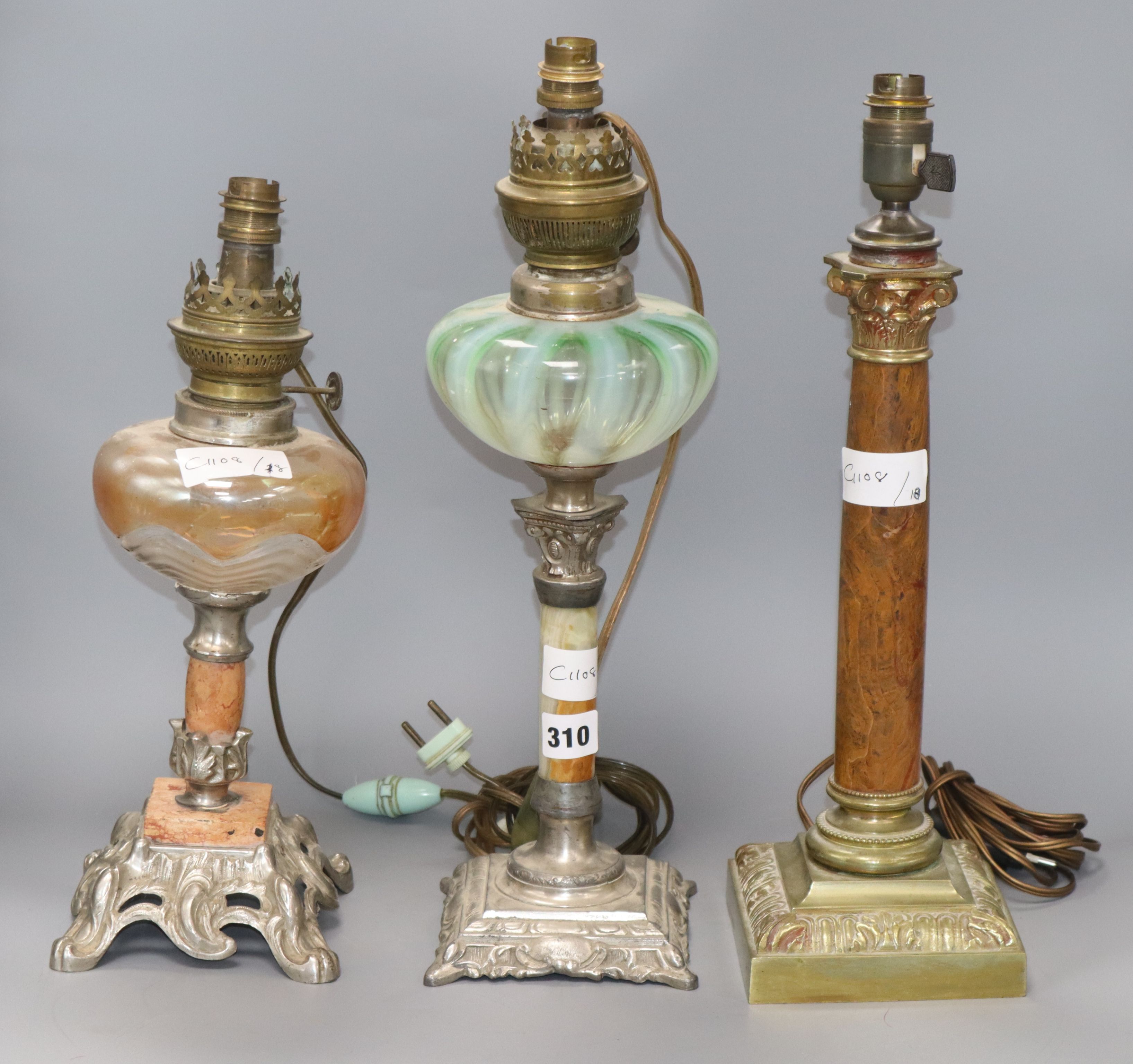 Two oil lamps and one corinthian column lamp