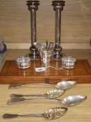 A Victorian cased five piece carving set with silver collars, a pair of plated candlesticks and