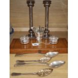 A Victorian cased five piece carving set with silver collars, a pair of plated candlesticks and