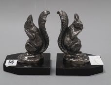 A pair of Deco squirrel bookends, signed Frecourt height 12cm