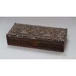 An Indian carved sandalwood glove box length 30cm