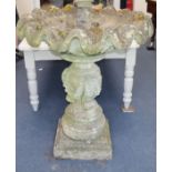 A reconstituted stone fountain in the form of a shell H.125cm approx.