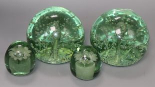 Two pairs of green glass dumps