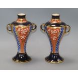 A pair of MacIntyre Burslem vases height 22.5cm