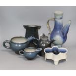 A group of blue glazed stoneware studio vessels