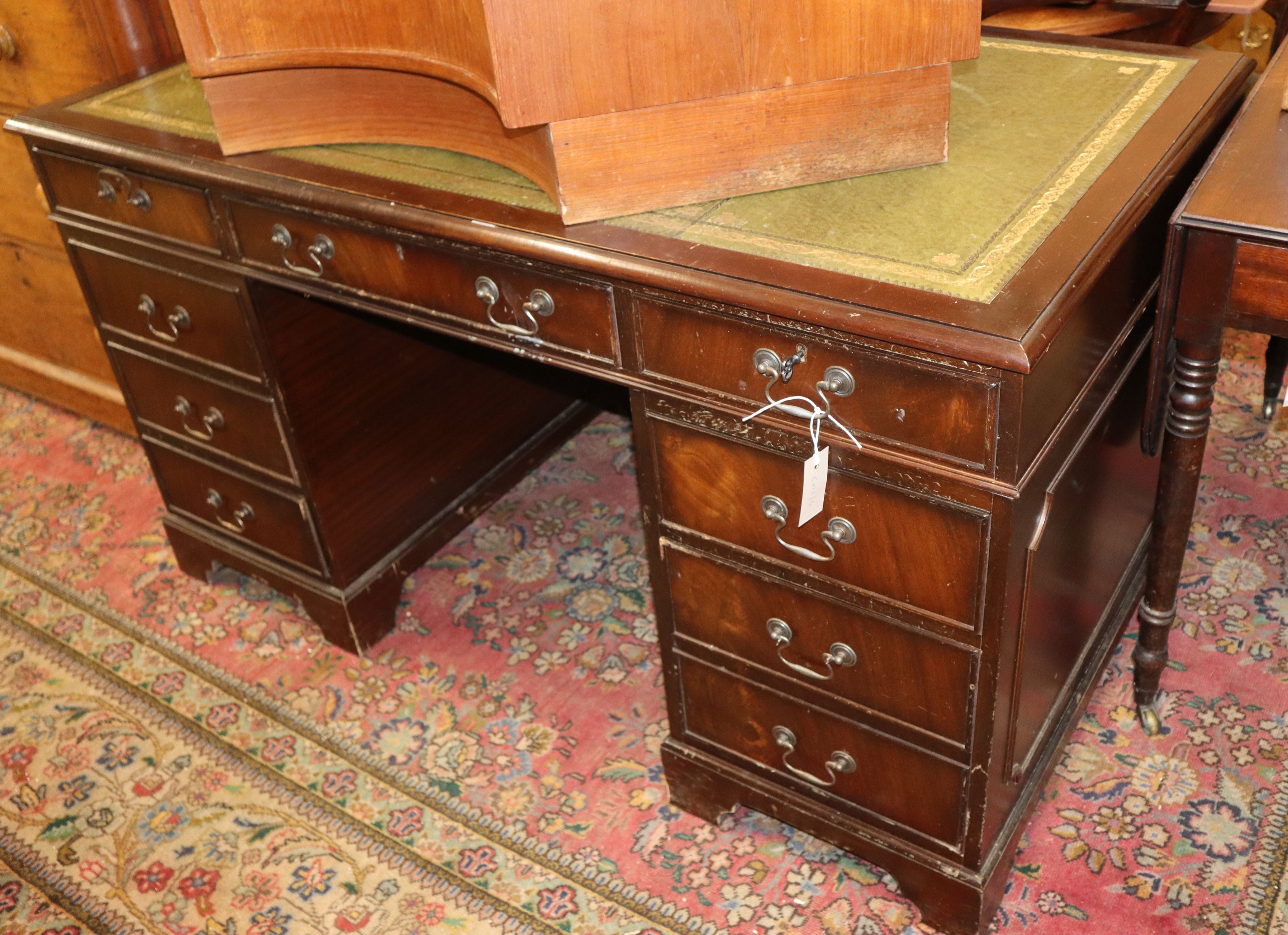 A mahogany pedestal desk W.137cm