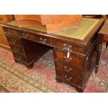 A mahogany pedestal desk W.137cm