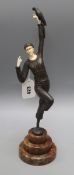An Art Deco style bronze and faux ivory figure height 39cm