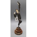 An Art Deco style bronze and faux ivory figure height 39cm