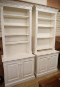 Two cupboards with shelves W.98cm