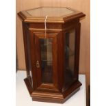 A Chinese hexagonal small display case W.48cm