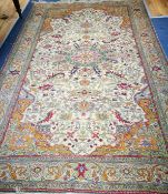 A Persian design carpet 310 x 198cm