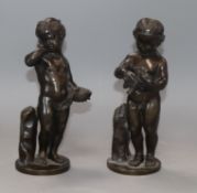 A pair of French bronze putti height 19cm