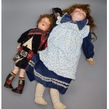Two bisque-headed dolls
