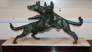 An Art Deco spelter group of a pair of dogs, on marble base, length 65cm