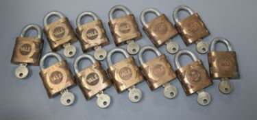 Eleven vintage Yale padlock and keys