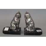 A pair of Art Deco bookends modelled as cats, signed Franjou