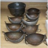 Eight tinned copper begging bowls