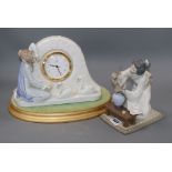 A Lladro clock on base and a Japanese figure