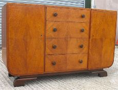 A 1930s Art Deco walnut dining table and sideboard L.166cm and sideboard W.138cm