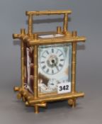 A Chinese reproduction enamel bamboo carriage clock