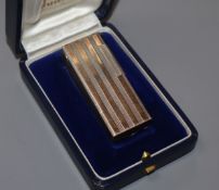 A two colour Dunhill silver lighter, cased height 6.5cm