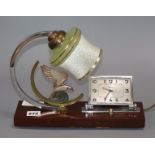 An Art Deco figural lamp / clock