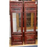 A pair of 19th century Chinese carved wood and glazed panels W.40cm