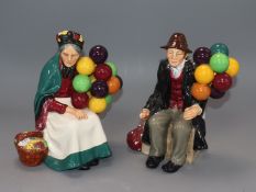 A pair of Royal Doulton figures 'The Balloon Man' and ' The Old Balloon Seller'