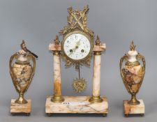 A Louis XVI style Sienna marble clock garniture