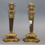A pair of ormolu Empire style candlesticks height 27cm
