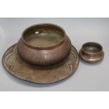 A copper tray and two bowls