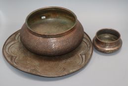 A copper tray and two bowls