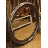 A large circular mirror W.99cm