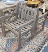 Two wooden garden chairs