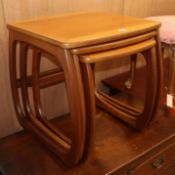 A nest of three Nathan tea tables W.53cm