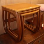 A nest of three Nathan tea tables W.53cm