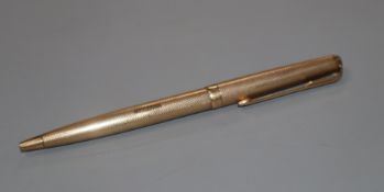 A Parker 9ct gold engine turned ballpoint pen