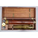 A cased astronomical telescope by Gilbert & Gilkerson, Tower Hill, London, with spare lenses and