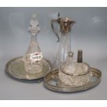 A cut glass bowl with a silver rim, a plated mounted glass claret jug, a glass decanter and sundry