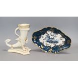 A Worcester cream and gilt ram's headed cornucopia, a Worcester blue and gilt dish, a Coalport