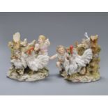 A pair of porcelain figurines height 9cm