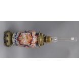 An Imari vase converted to an oil lamp