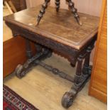 A carved oak hall table W.90cm