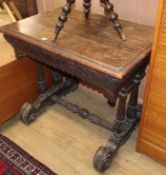 A carved oak hall table W.90cm