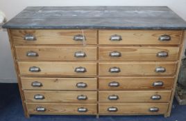A Victorian zinc top pine twelve drawer chest W.141cm