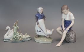 Two Royal Copenhagen figures and a Lladro swan group, 'Follow Me'